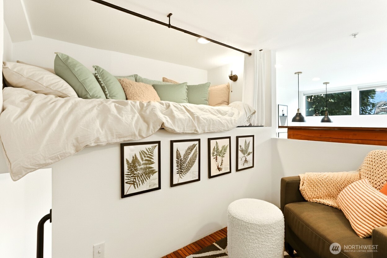 3604 Palatine Avenue North Seattle, WA 98103 - Photo 11 of 29 a bedroom with a bed and couch