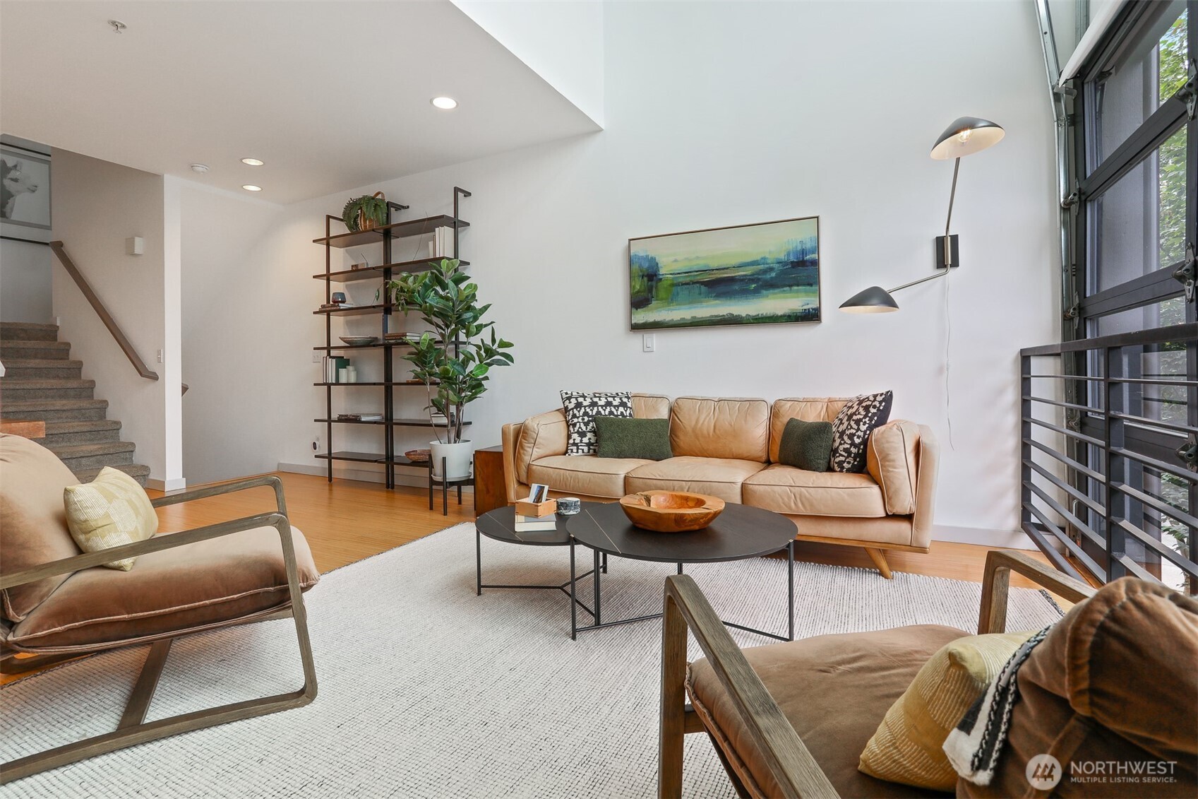 3604 Palatine Avenue North Seattle, WA 98103 - Photo 13 of 29 a living room with furniture and a potted plant