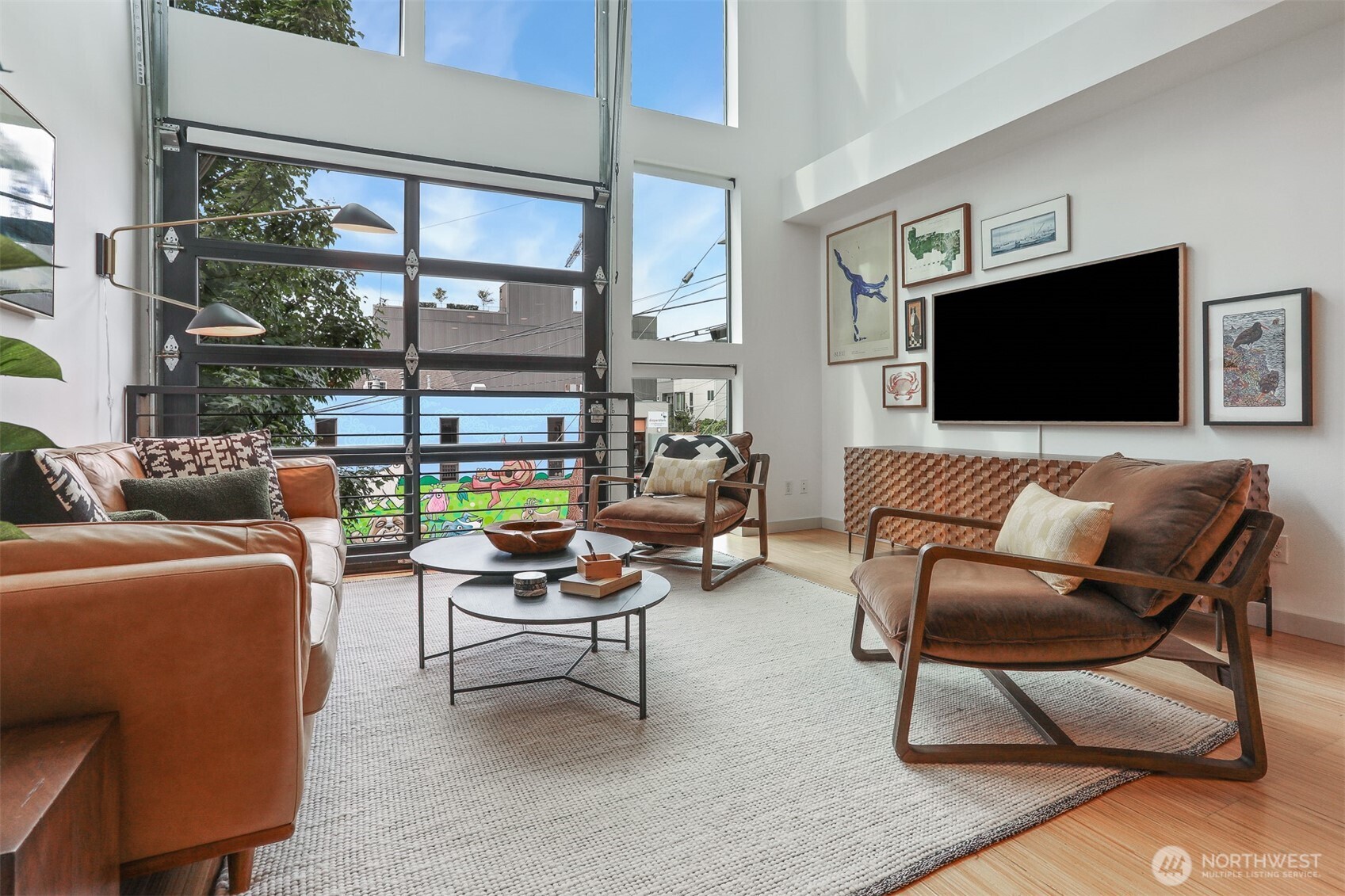 3604 Palatine Avenue North Seattle, WA 98103 - Photo 2 of 29 a living room with furniture and a flat screen tv