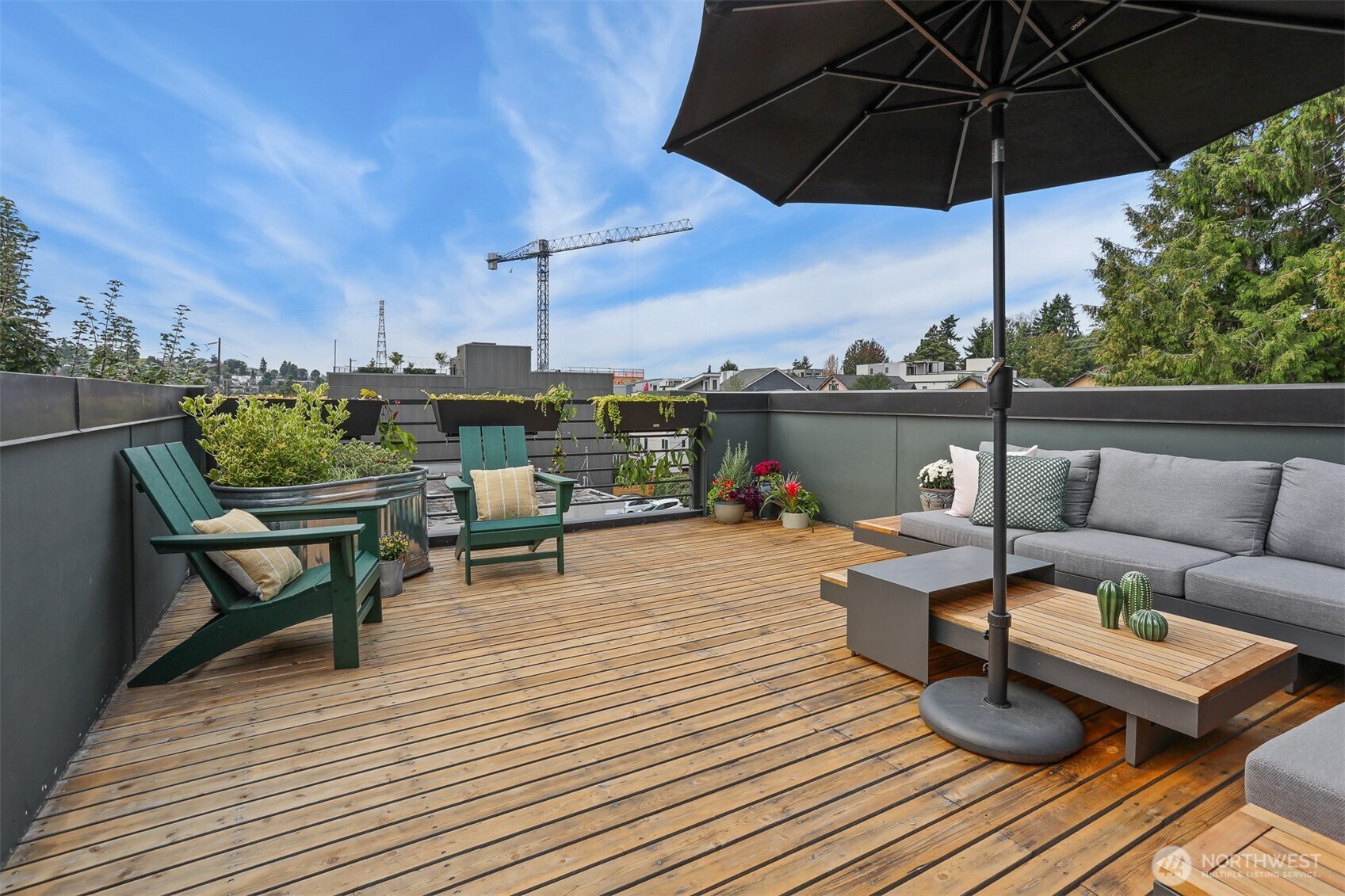 3604 Palatine Avenue North Seattle, WA 98103 - Photo 26 of 29 an outdoor sitting area with furniture and wooden floor