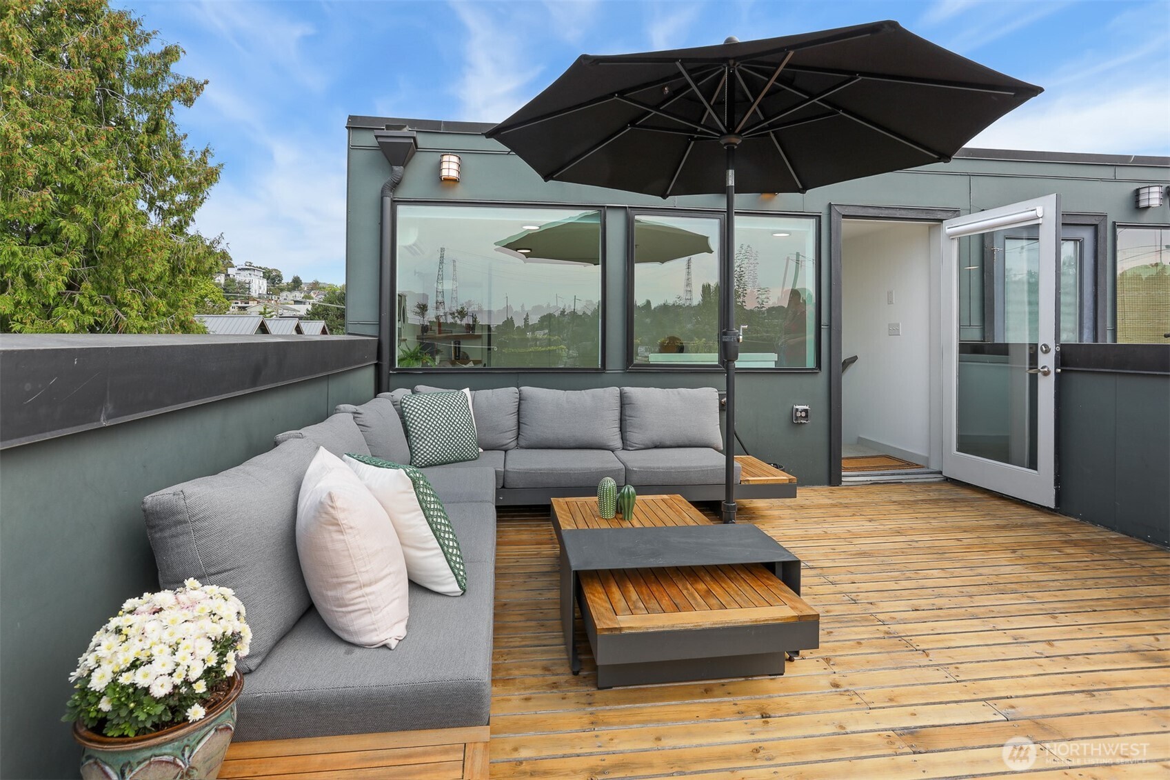 3604 Palatine Avenue North Seattle, WA 98103 - Photo 27 of 29 a outdoor living space with furniture and umbrella