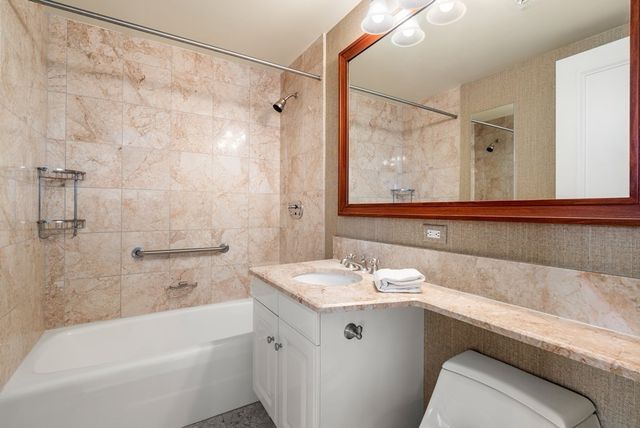 a bathroom with a sink and a bathtub