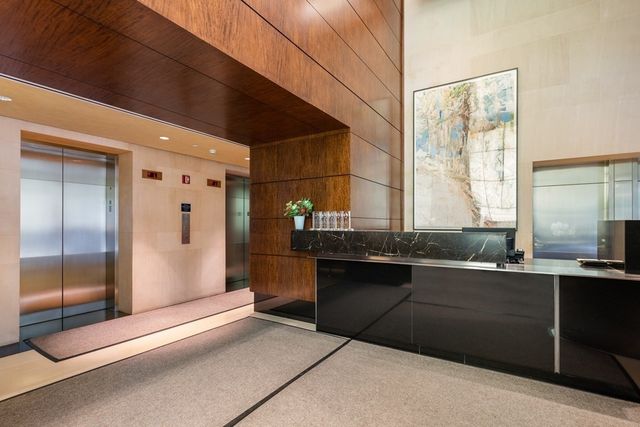 a kitchen with a sink and refrigerator