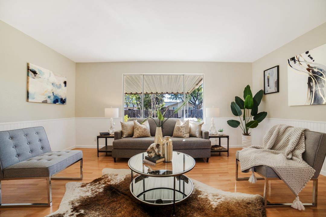 835 Fillippelli Drive Gilroy, CA 95020 - Photo 13 of 45 a living room with furniture and a large window