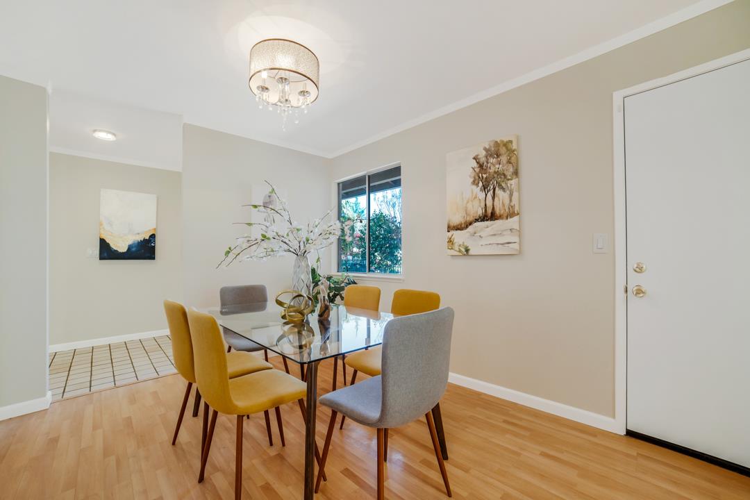 835 Fillippelli Drive Gilroy, CA 95020 - Photo 17 of 45 a view of a dining room with furniture and wooden floor