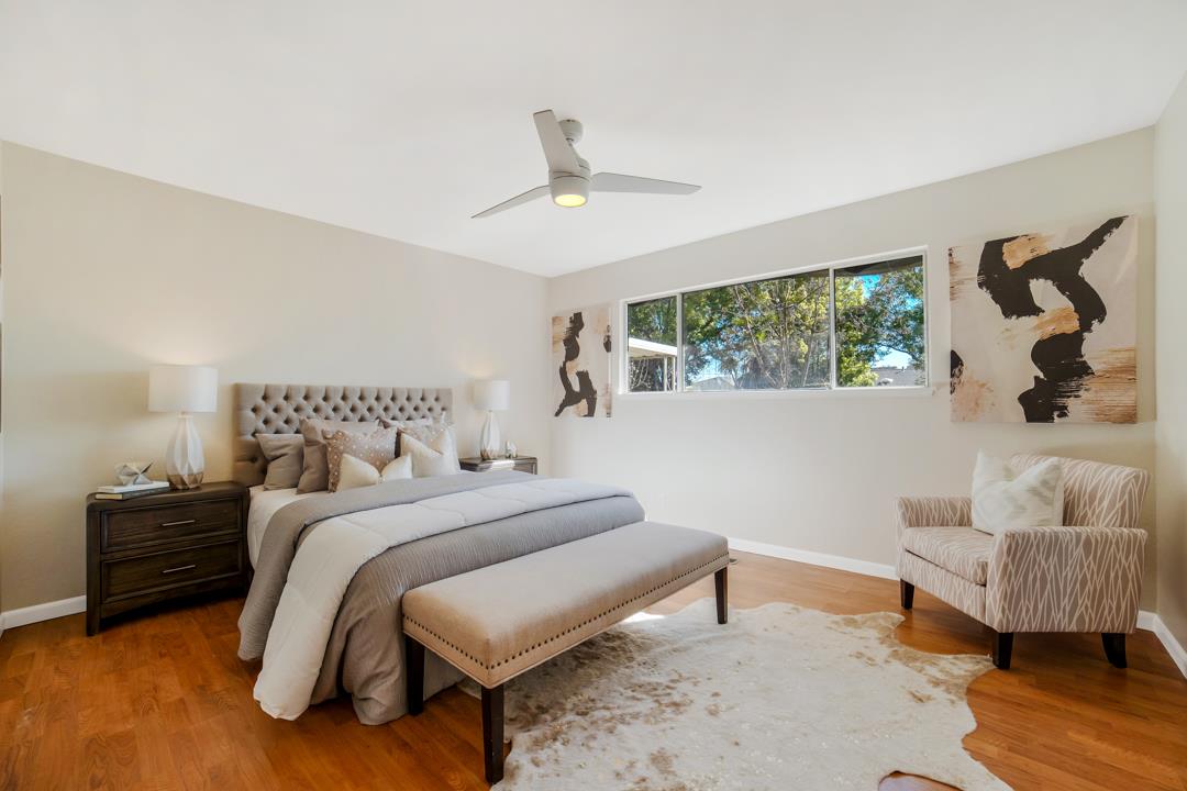 835 Fillippelli Drive Gilroy, CA 95020 - Photo 18 of 45 a bedroom with a bed and a couch