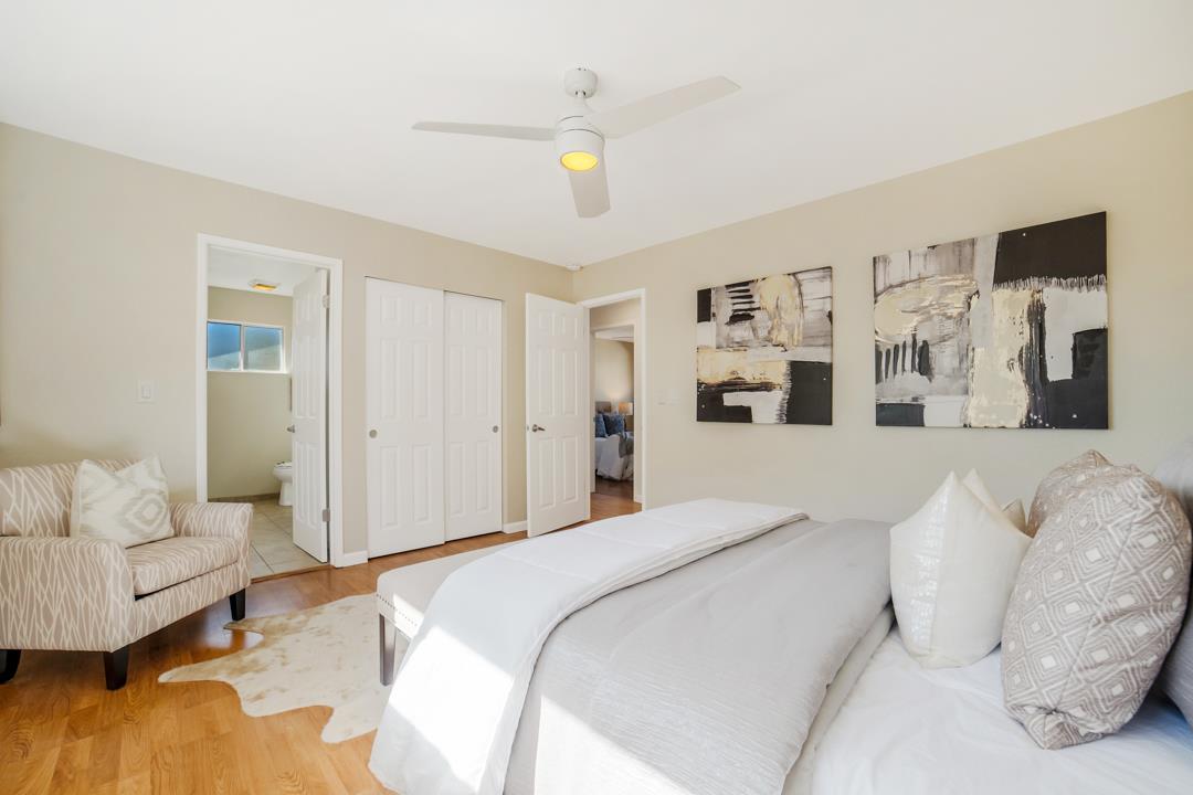 835 Fillippelli Drive Gilroy, CA 95020 - Photo 19 of 45 a bedroom with a bed and a couch