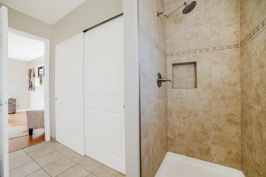 835 Fillippelli Drive Gilroy, CA 95020 - Photo 21 of 45 a bathroom with a shower and a toilet