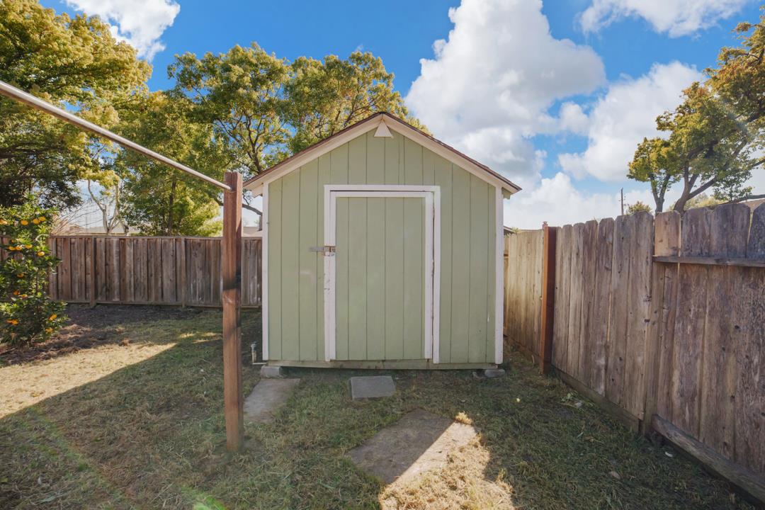 835 Fillippelli Drive Gilroy, CA 95020 - Photo 35 of 45 a view of a house with a yard and wooden fence