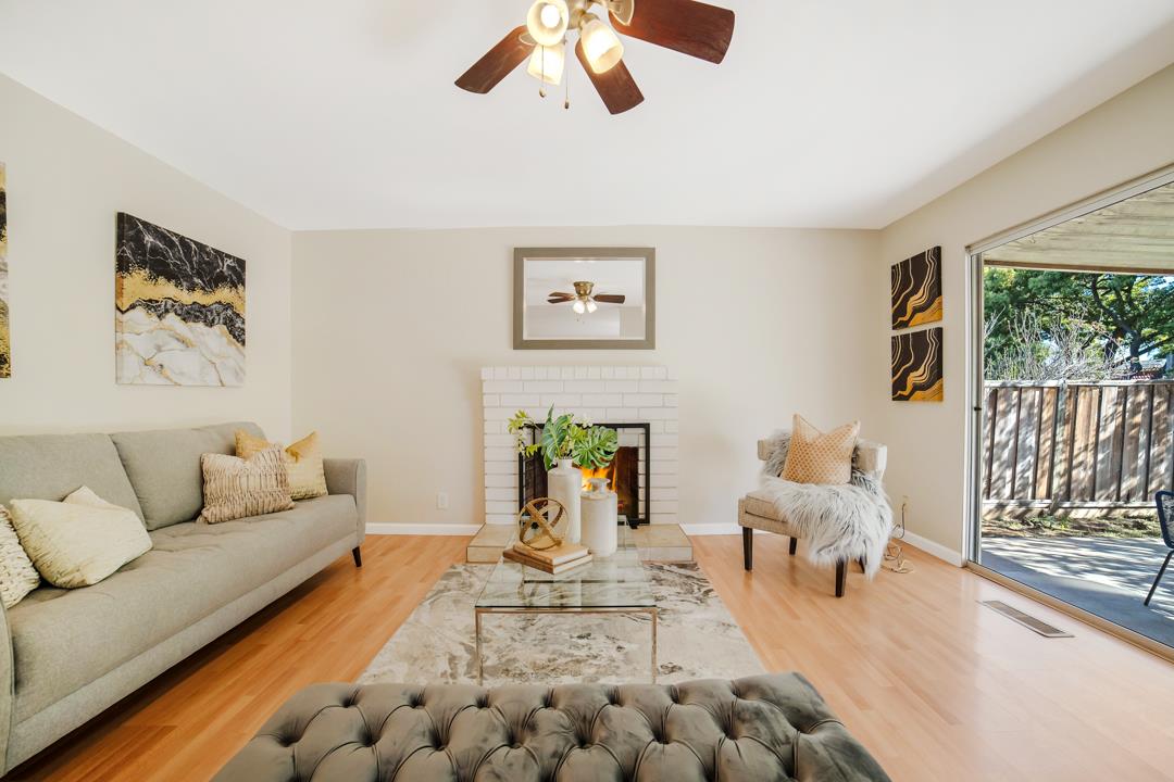 835 Fillippelli Drive Gilroy, CA 95020 - Photo 10 of 45 a living room with furniture and a table