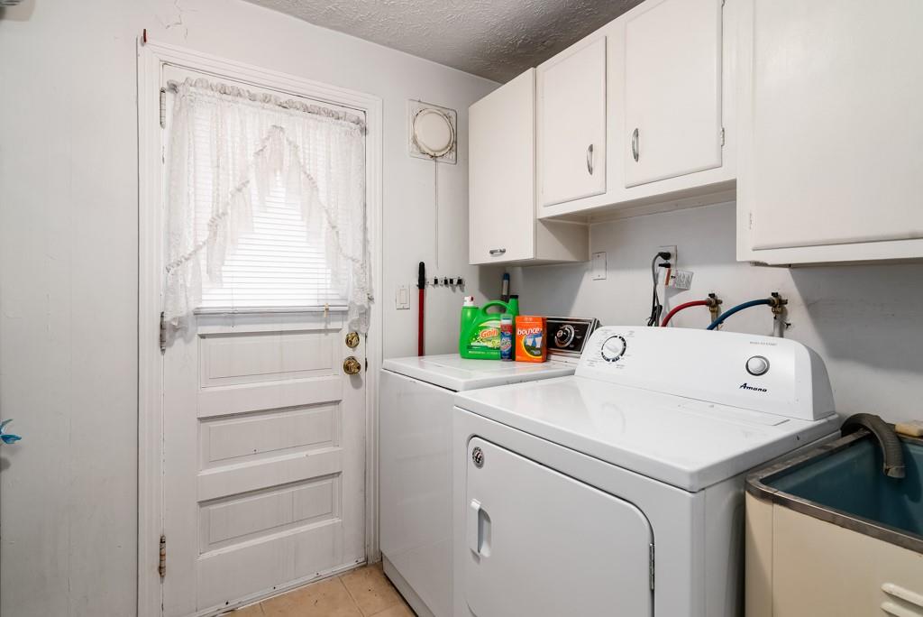 8180 Peebles Road Pittsburgh, PA 15237 - Photo 14 of 24 a utility room with dryer and washer