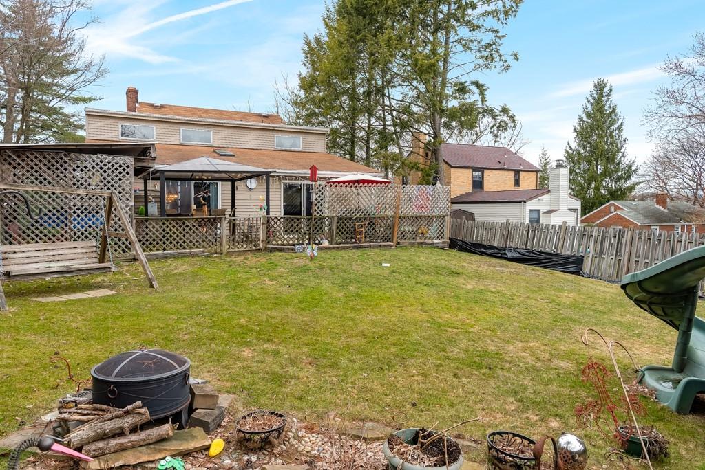 8180 Peebles Road Pittsburgh, PA 15237 - Photo 23 of 24 a view of a house with backyard porch and furniture