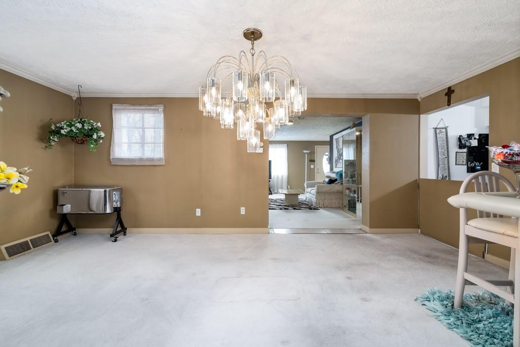 8180 Peebles Road Pittsburgh, PA 15237 - Photo 4 of 24 a view of a livingroom with furniture and chandelier