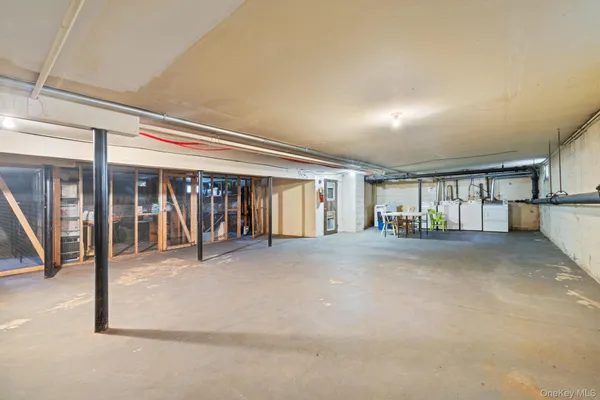 a view of an empty room with stairs