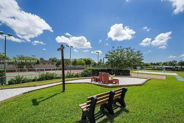 a garden view with a sitting space