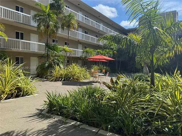 a view of a back yard of the house