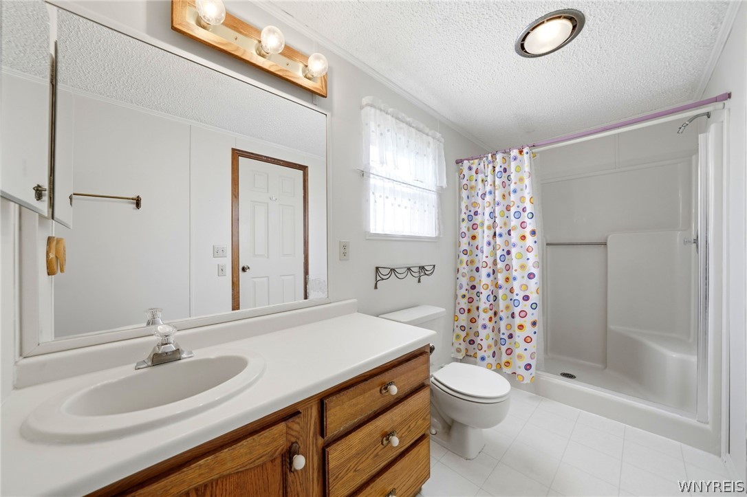 22 Cypress Road Cheektowaga, NY 14227 - Photo 20 of 28 Primary walk in shower