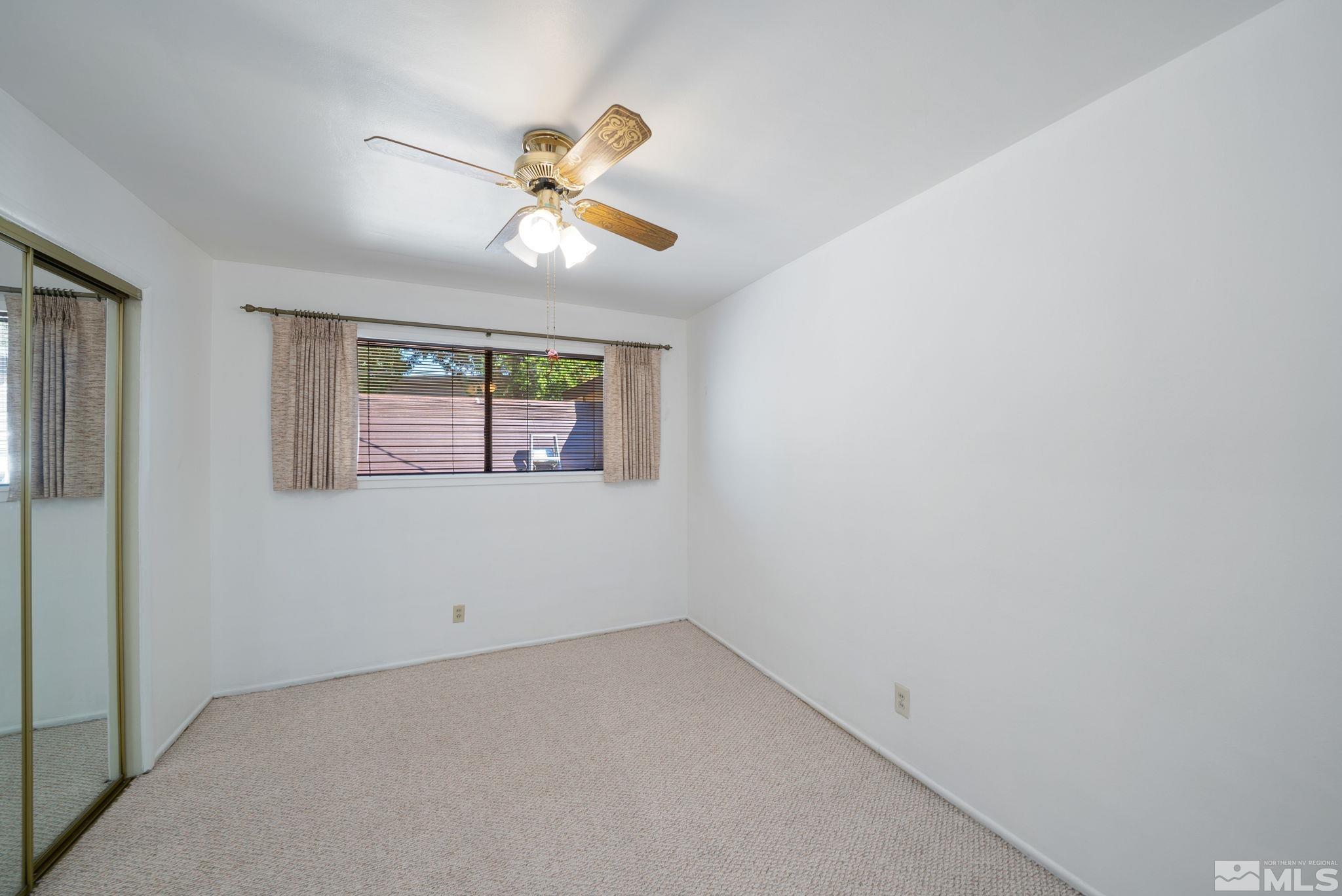 1535 Harvard Way Reno, NV 89502 - Photo 15 of 26 a view of an empty room with a window