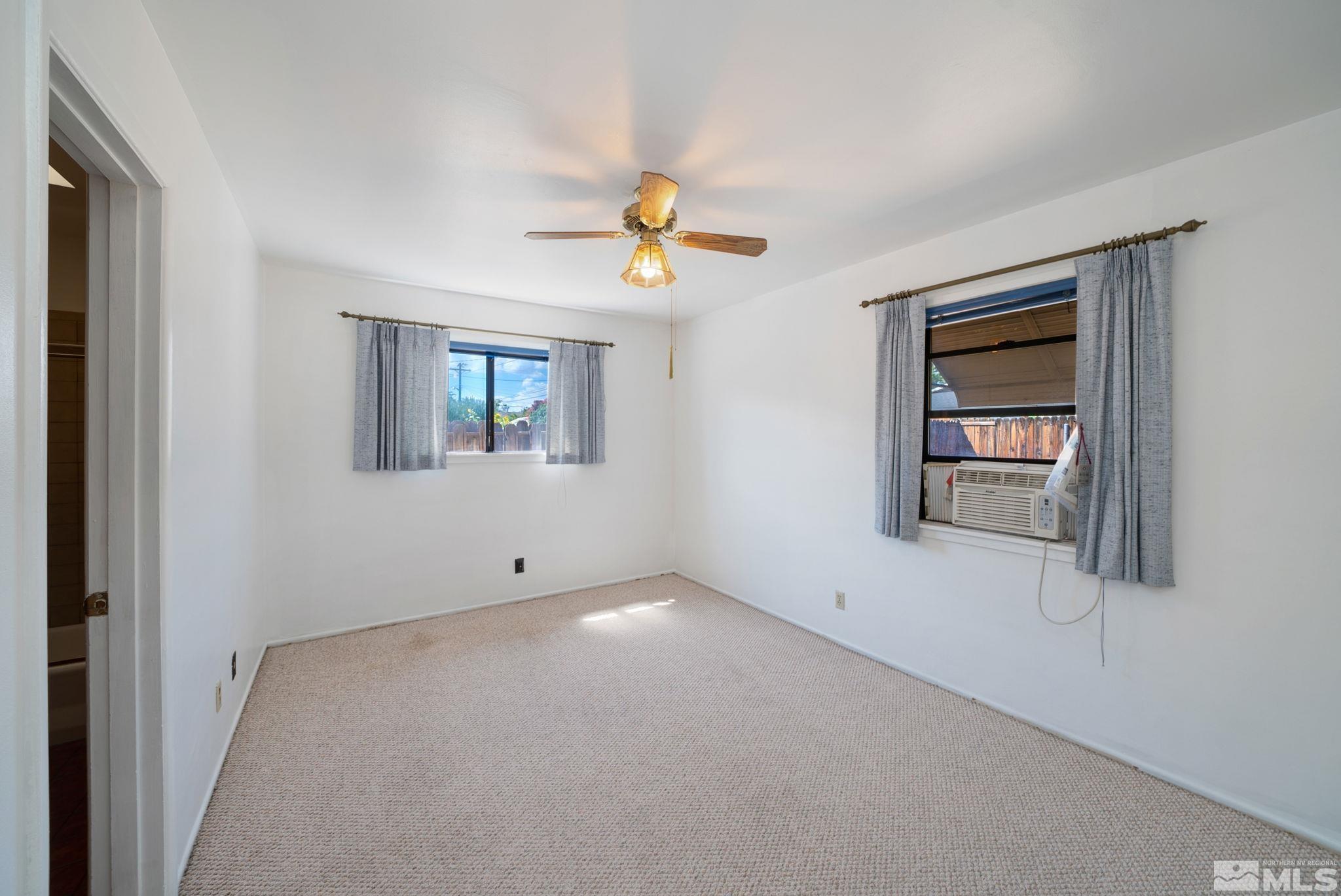 1535 Harvard Way Reno, NV 89502 - Photo 18 of 26 a view of an empty room with a window