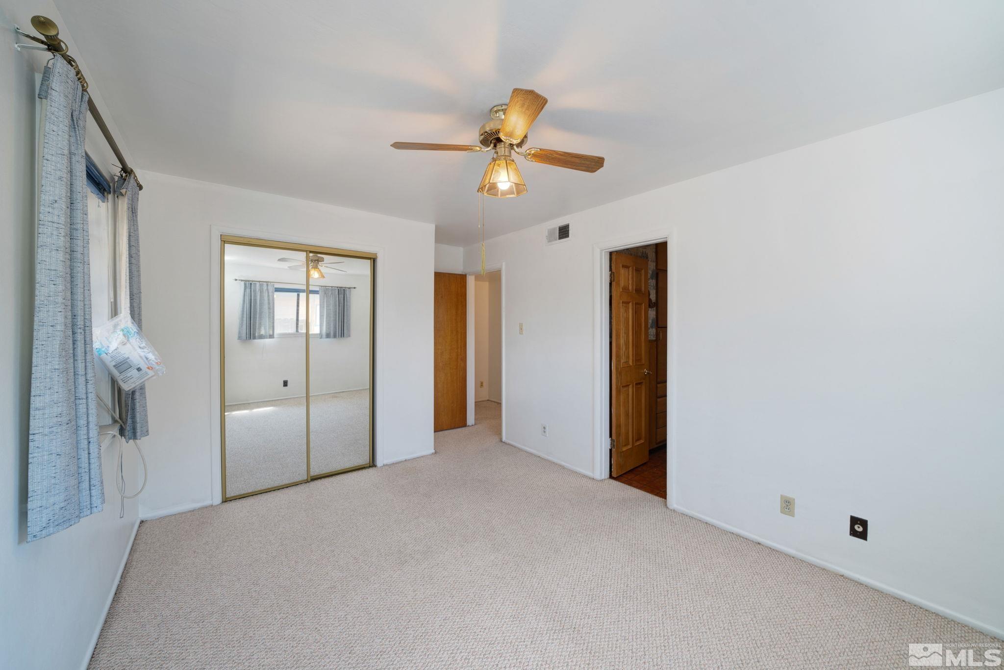 1535 Harvard Way Reno, NV 89502 - Photo 19 of 26 a view of empty room with window