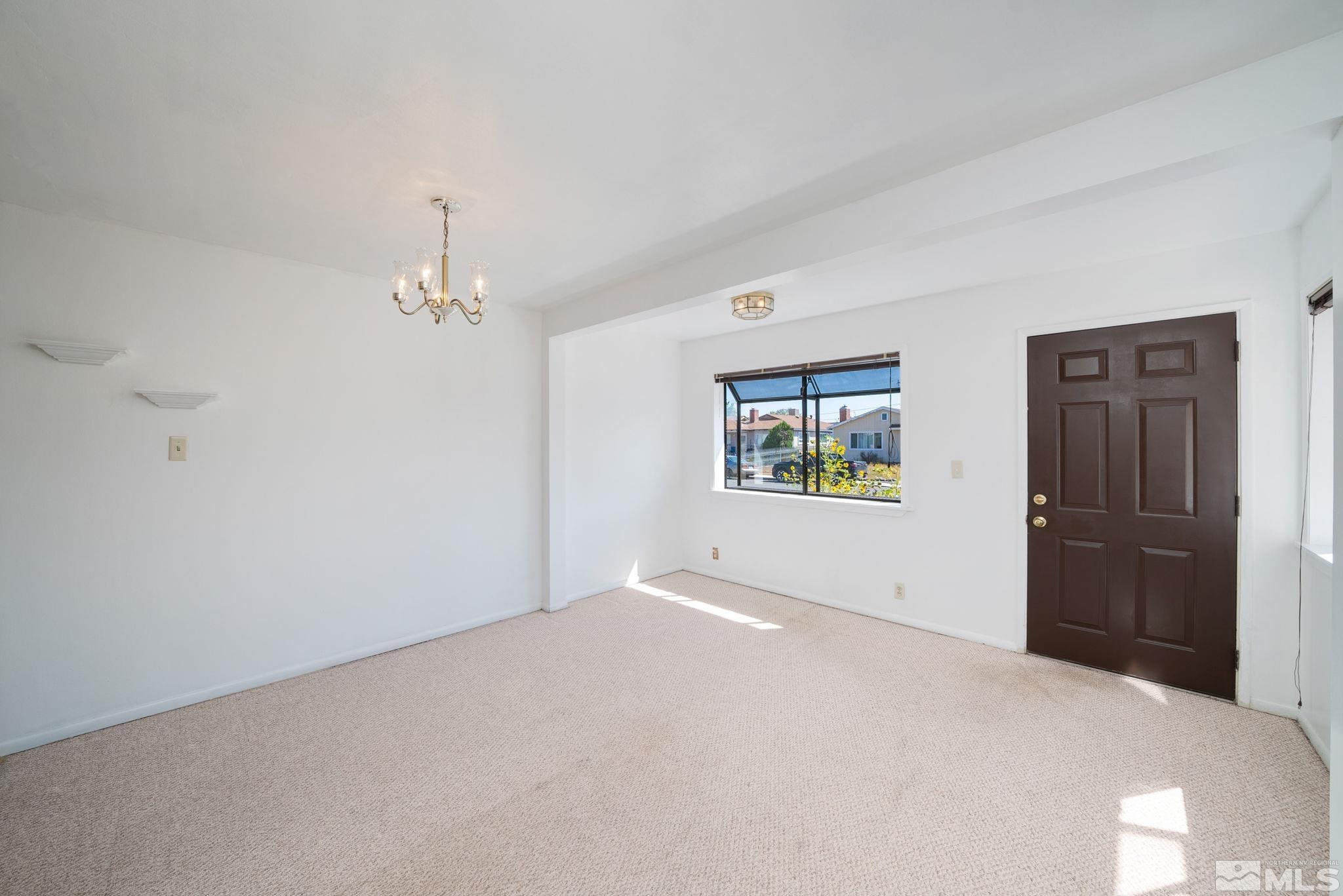 1535 Harvard Way Reno, NV 89502 - Photo 4 of 26 a view of empty room with windows