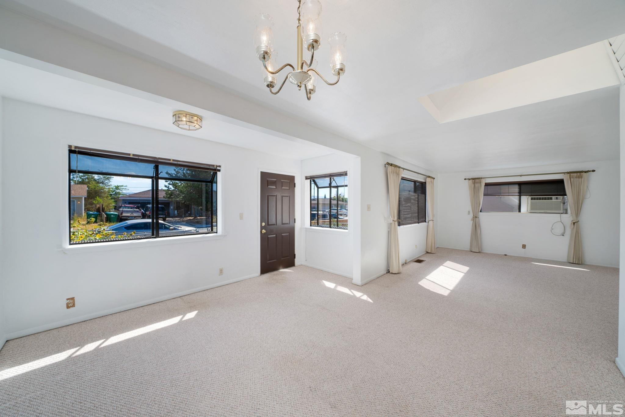 1535 Harvard Way Reno, NV 89502 - Photo 5 of 26 a view of empty room with window and ceiling fan