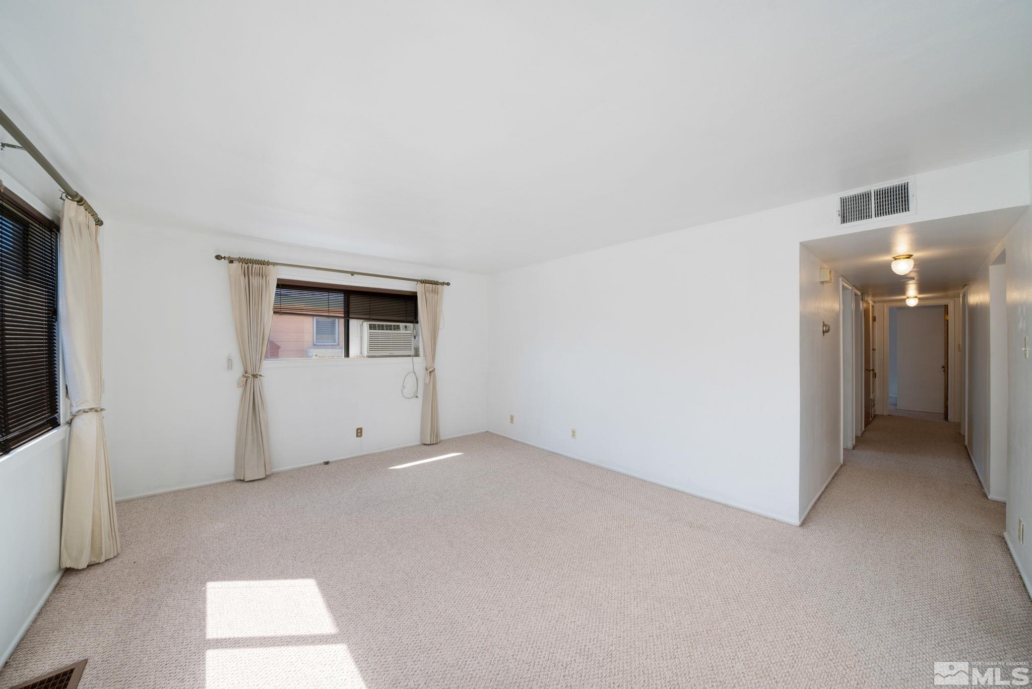 1535 Harvard Way Reno, NV 89502 - Photo 7 of 26 a view of an empty room with a window