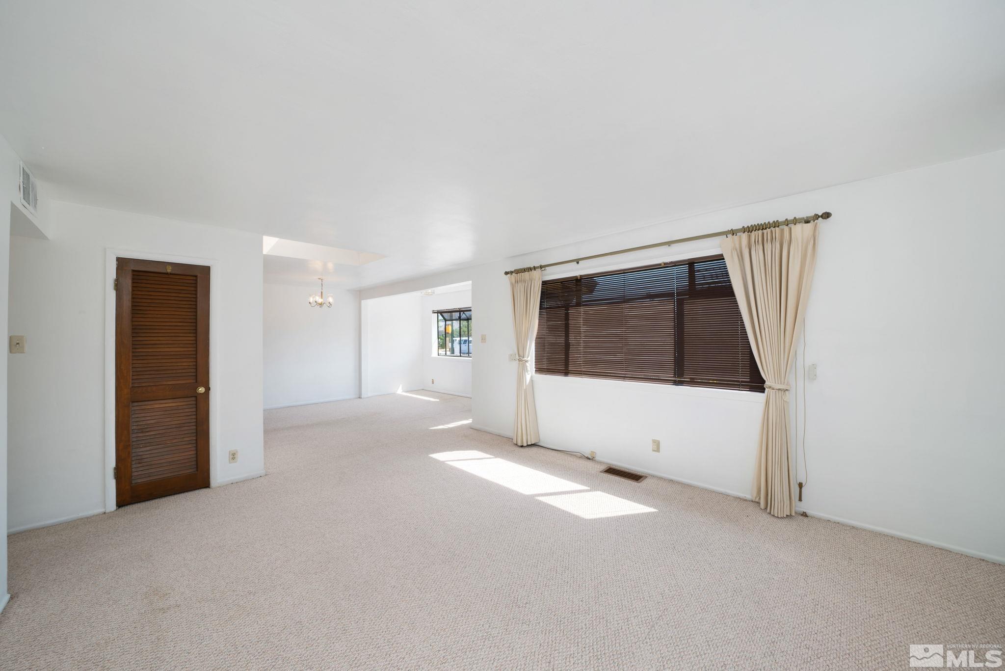 1535 Harvard Way Reno, NV 89502 - Photo 9 of 26 a view of an empty room with window