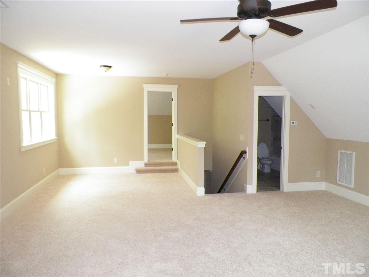 6128 Spring Branch Circle Raleigh, NC 27603 - Photo 16 of 25 a view of empty room with windows