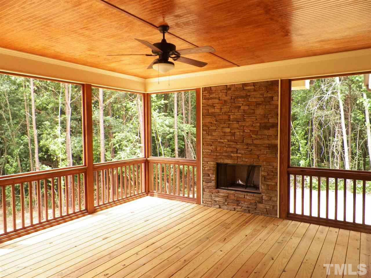 6128 Spring Branch Circle Raleigh, NC 27603 - Photo 21 of 25 a view of outdoor space with wooden floor and iron stairs