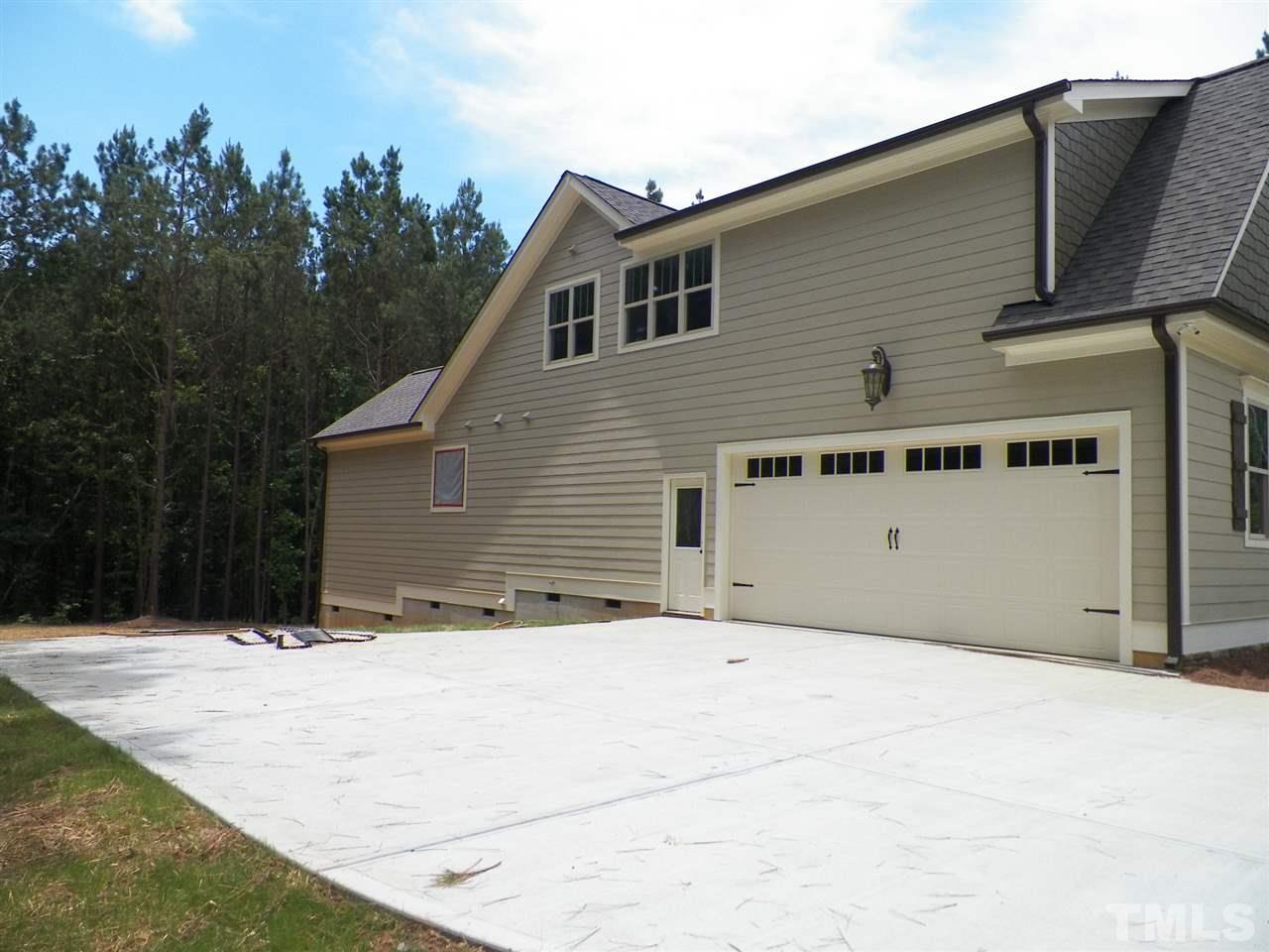 6128 Spring Branch Circle Raleigh, NC 27603 - Photo 23 of 25 a view of a house with a snow in the background