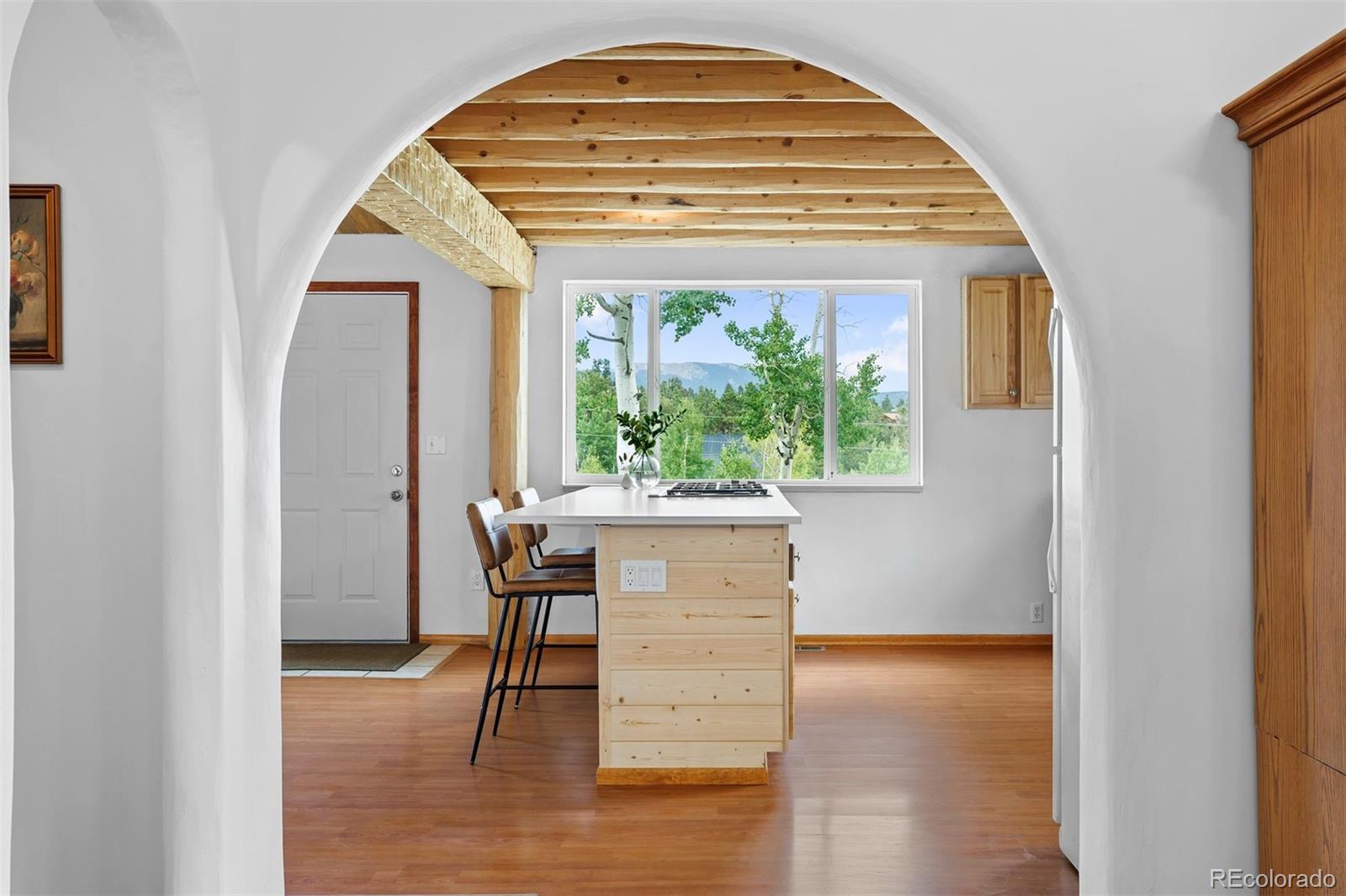 616 South Pine Drive Bailey, CO 80421 - Photo 16 of 50 a view of kitchen with wooden floor and seating space