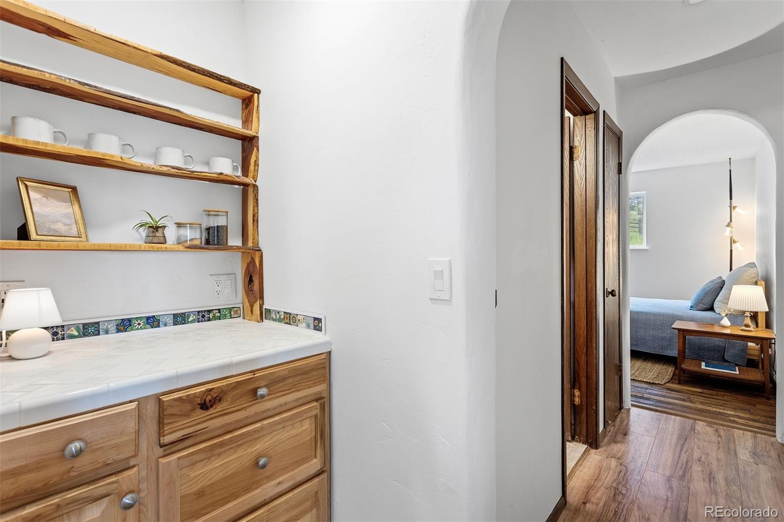 616 South Pine Drive Bailey, CO 80421 - Photo 18 of 50 a view of cabinets and wooden floor