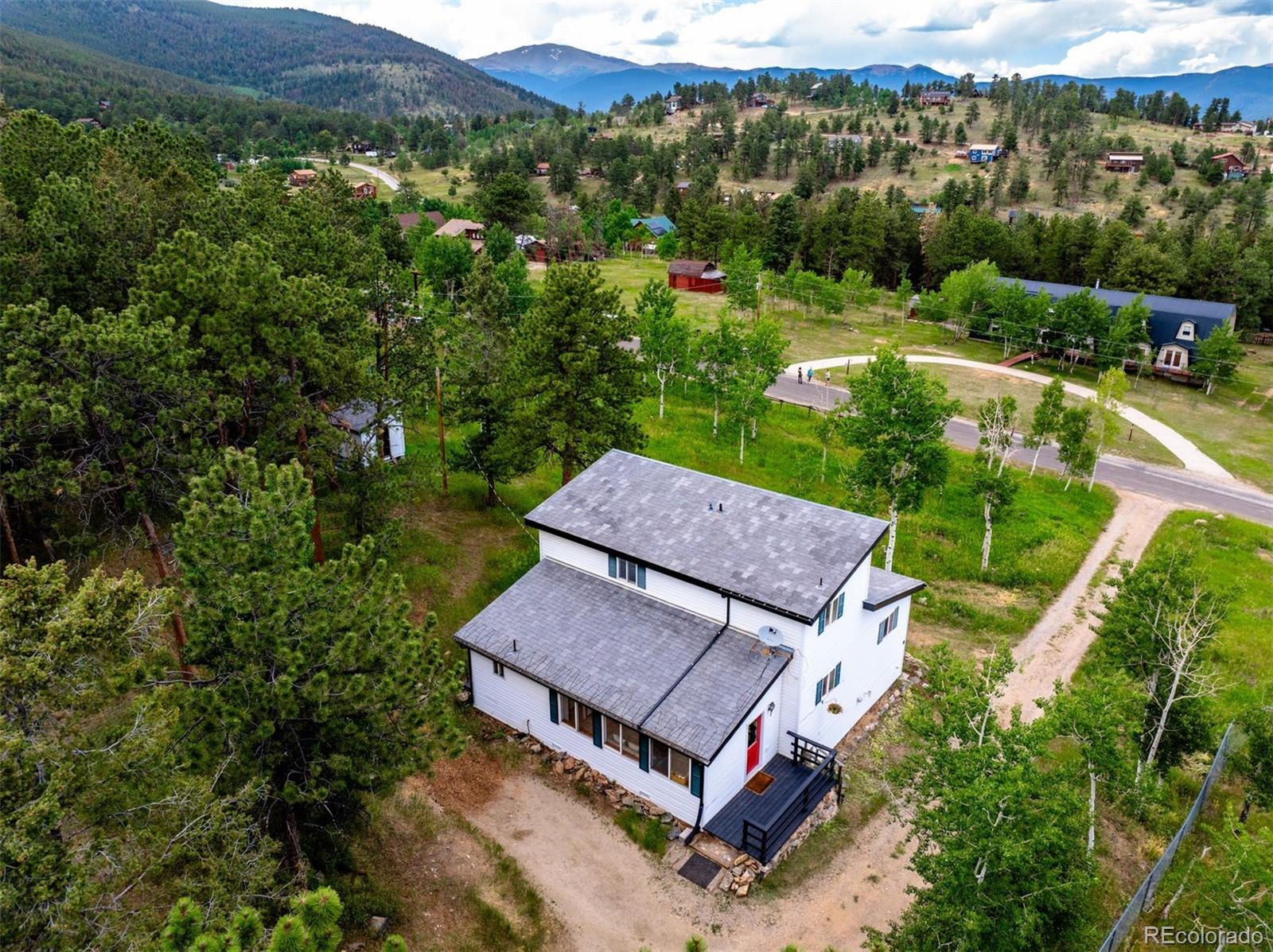616 South Pine Drive Bailey, CO 80421 - Photo 46 of 50 an aerial view of a house with a garden