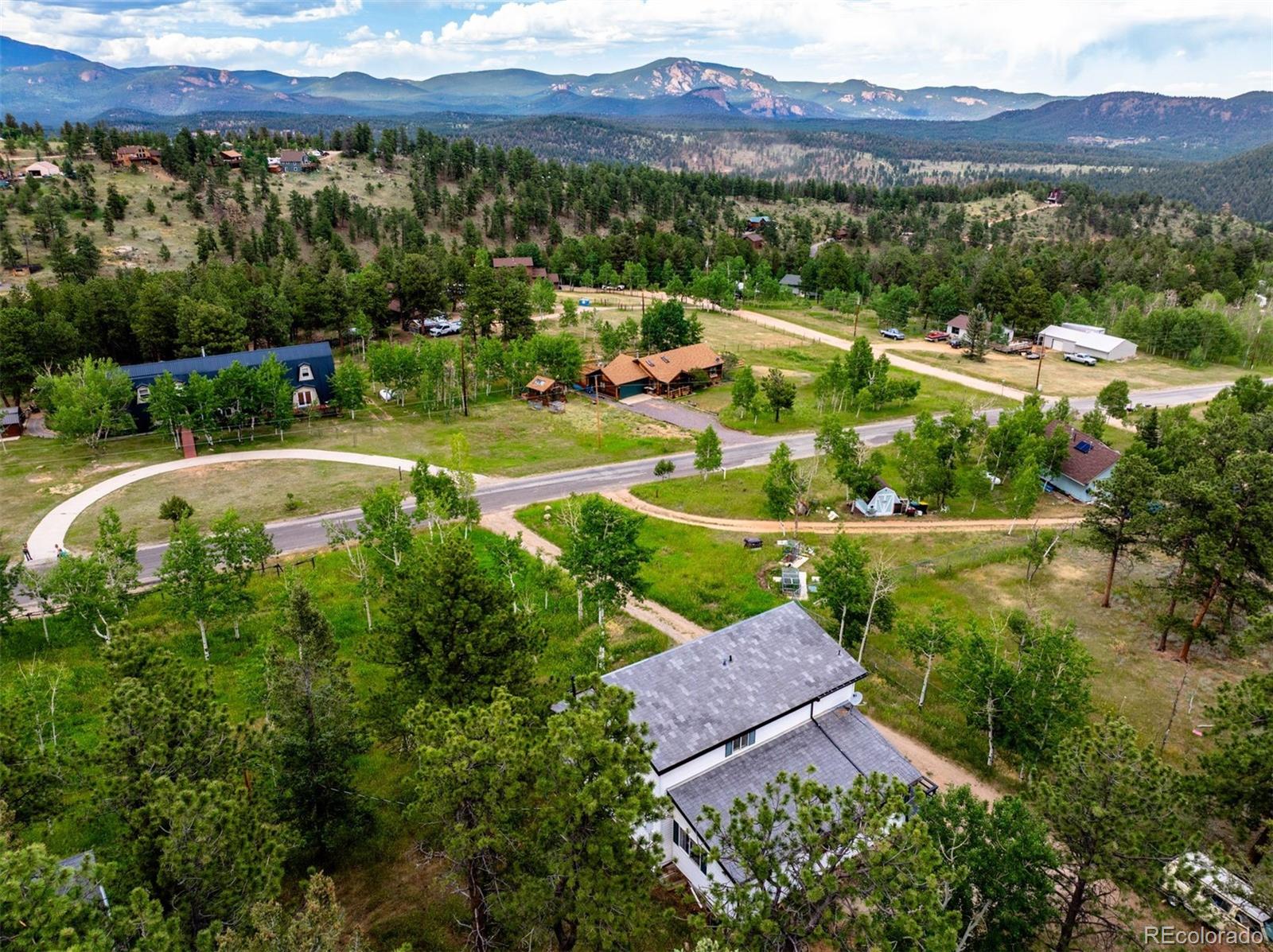 616 South Pine Drive Bailey, CO 80421 - Photo 47 of 50 a view of a city with mountains in the background