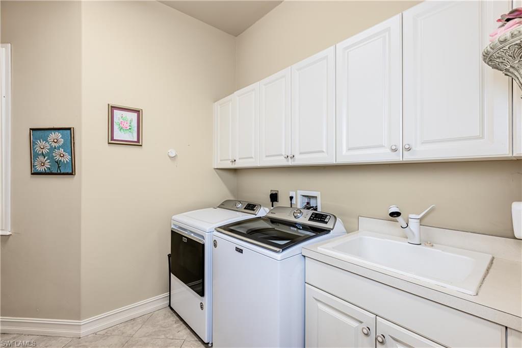 20174 Markward Crossing Estero, FL 33928 - Photo 15 of 30 a view of a storage and utility room with washer and dryer