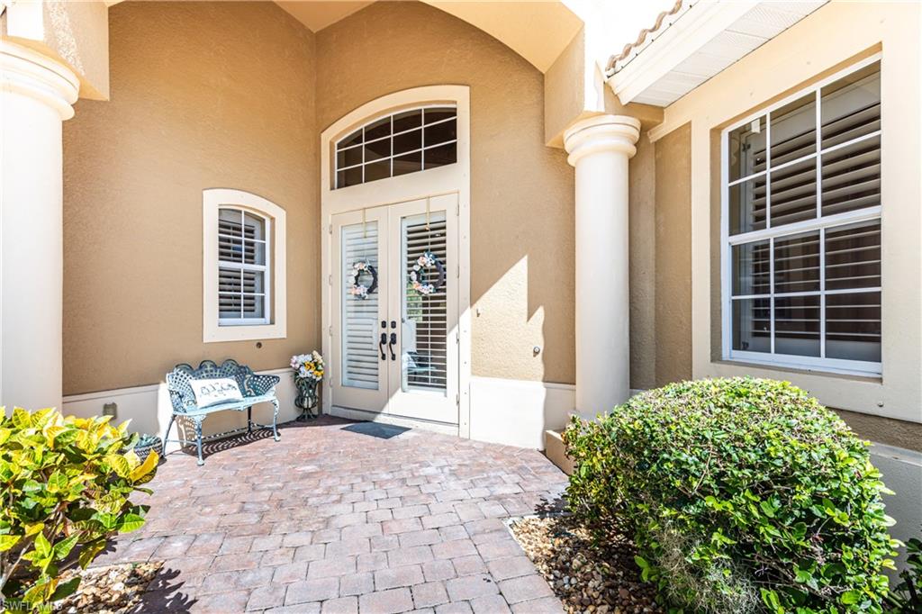 20174 Markward Crossing Estero, FL 33928 - Photo 3 of 30 a front view of a house with outdoor space