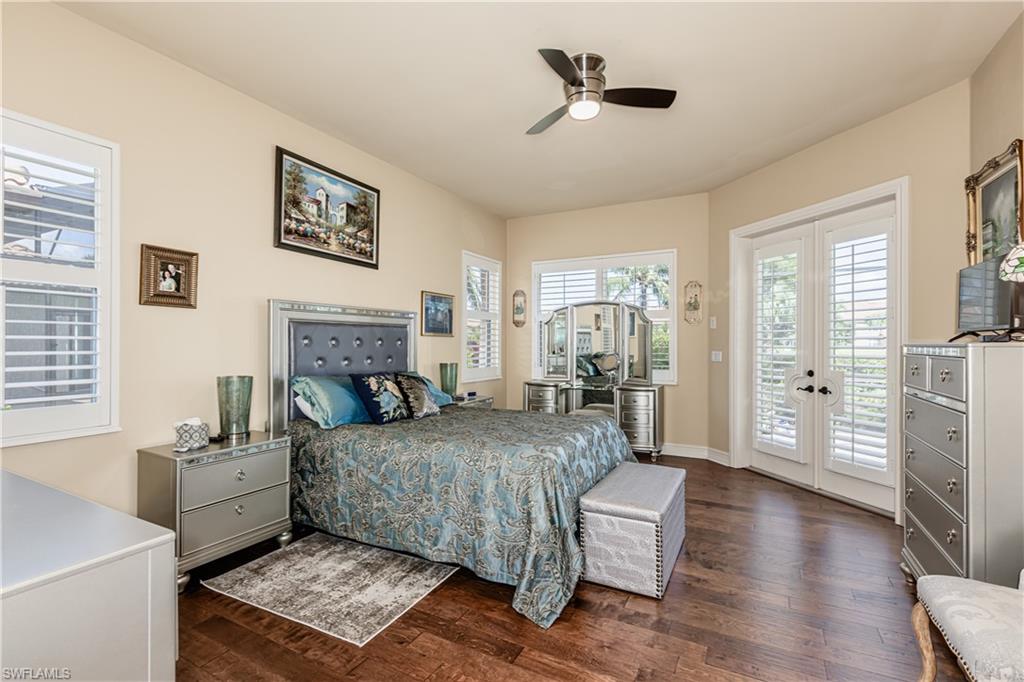 20174 Markward Crossing Estero, FL 33928 - Photo 8 of 30 a bedroom with a bed couch and a window