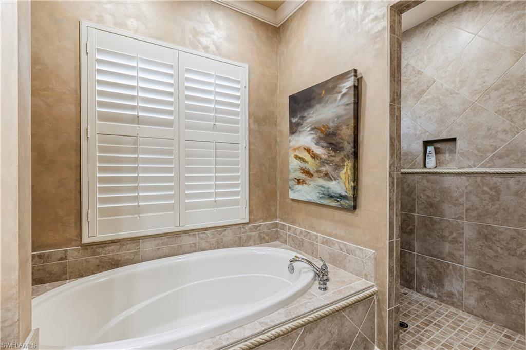 20174 Markward Crossing Estero, FL 33928 - Photo 10 of 30 a bath tub sitting next to a window