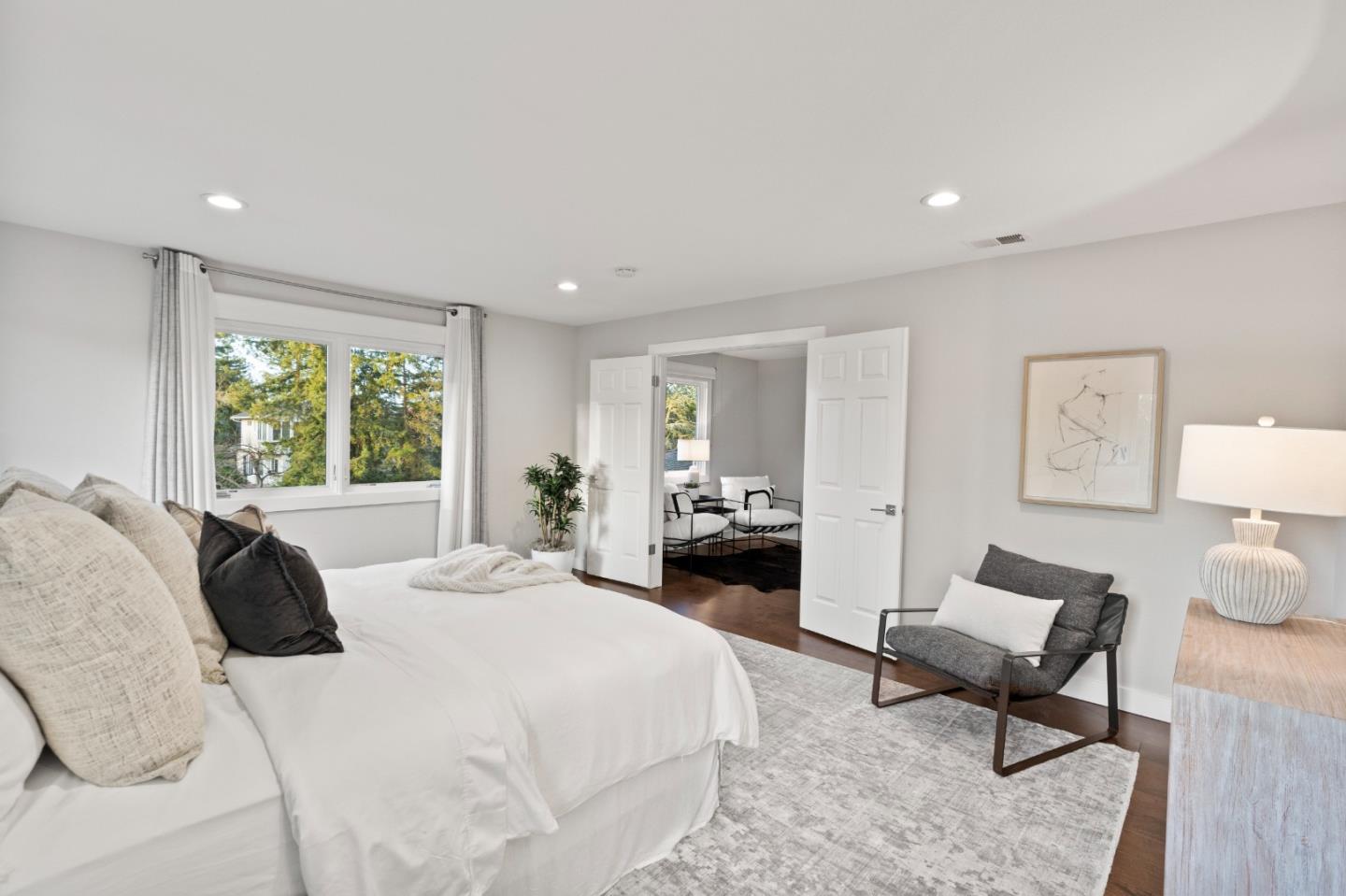 389 Bryant Avenue Mountain View, CA 94040 - Photo 25 of 61 a bedroom with a bed and wooden floor