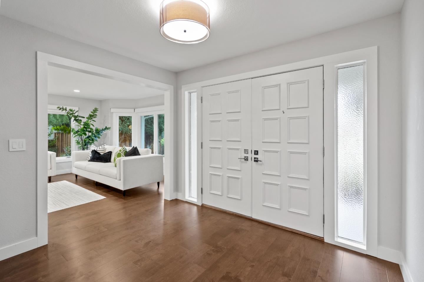 389 Bryant Avenue Mountain View, CA 94040 - Photo 4 of 61 a view of a livingroom with furniture and hardwood floor