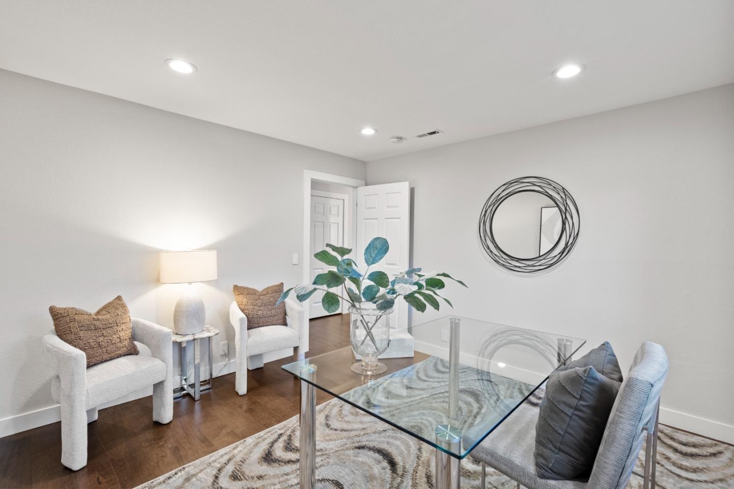 389 Bryant Avenue Mountain View, CA 94040 - Photo 42 of 61 a living room with furniture flowerpot and a potted plant