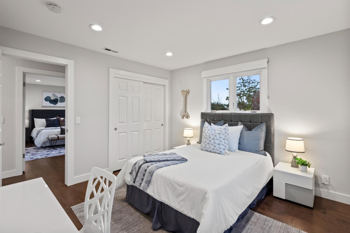 389 Bryant Avenue Mountain View, CA 94040 - Photo 46 of 61 a bedroom with a bed and painting on the wall