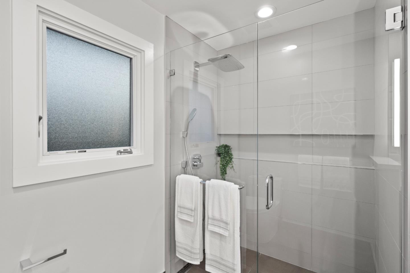 389 Bryant Avenue Mountain View, CA 94040 - Photo 50 of 61 a bathroom with a shower and a sink