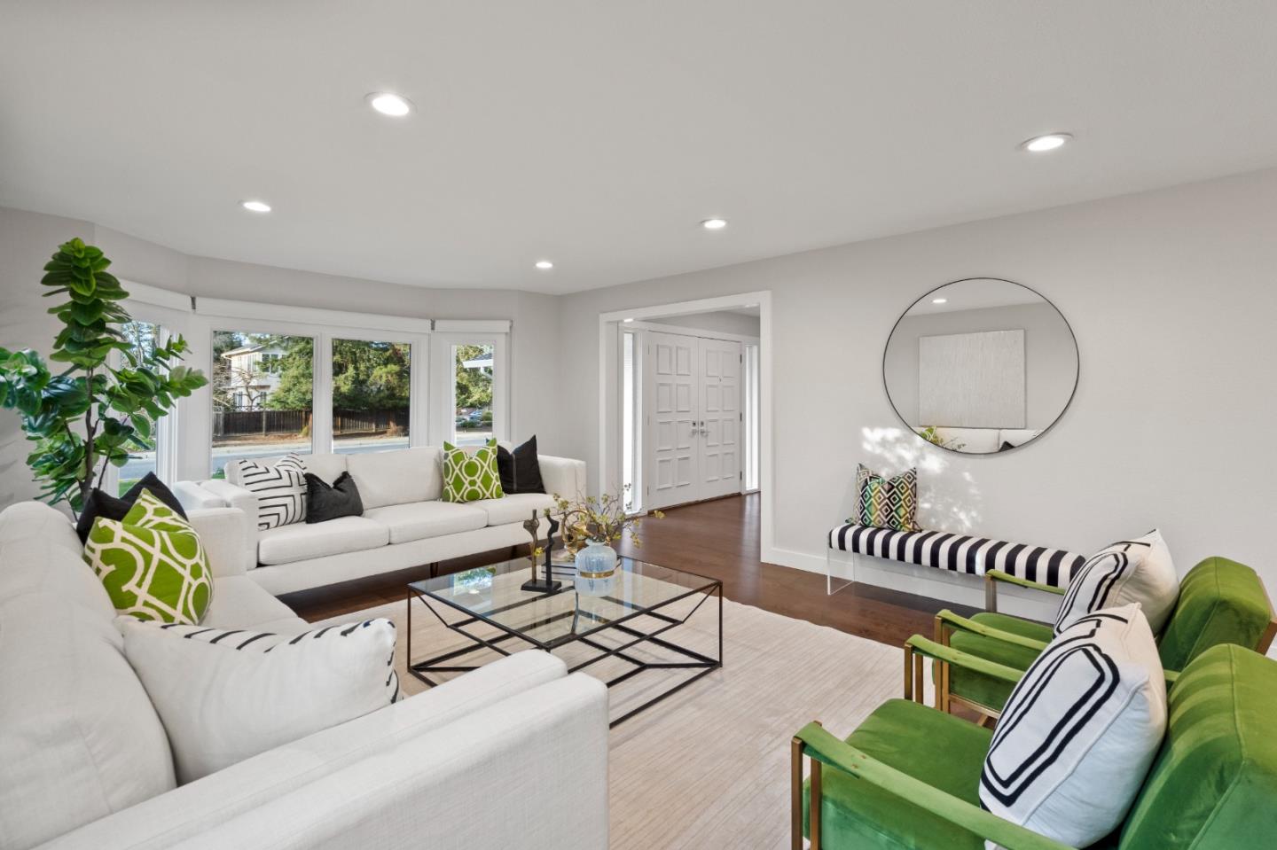 389 Bryant Avenue Mountain View, CA 94040 - Photo 5 of 61 a living room with furniture and a wooden floor