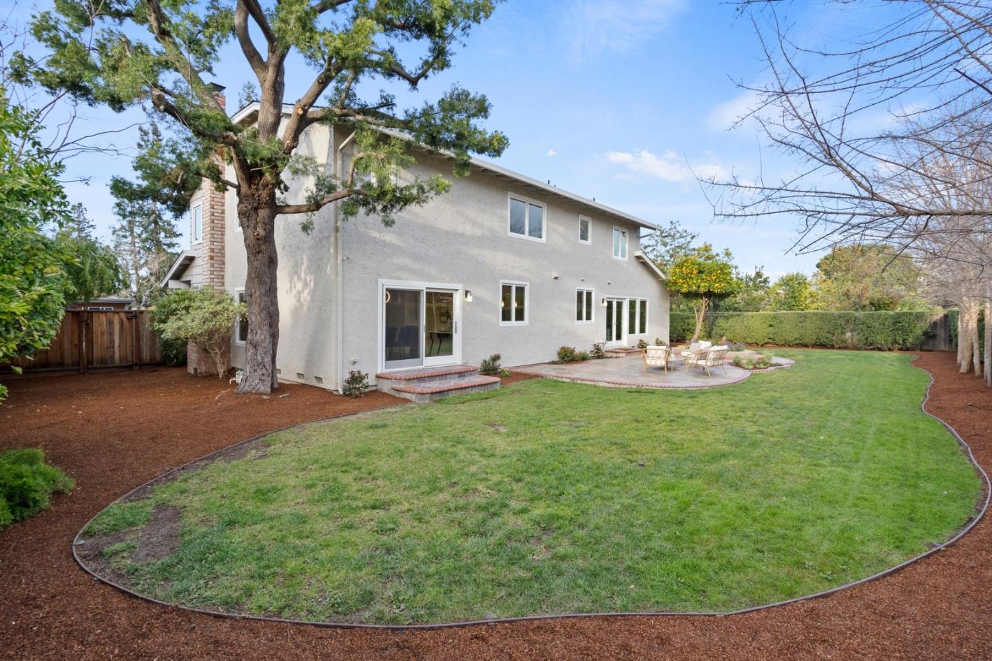 389 Bryant Avenue Mountain View, CA 94040 - Photo 54 of 61 a view of a house with backyard porch and sitting area