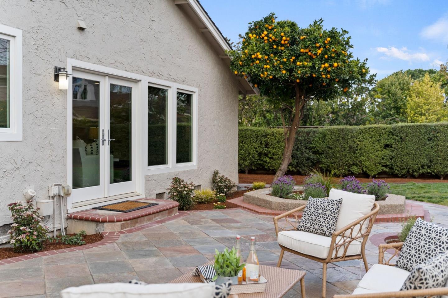 389 Bryant Avenue Mountain View, CA 94040 - Photo 56 of 61 a view of a patio with couches table and chairs and potted plants