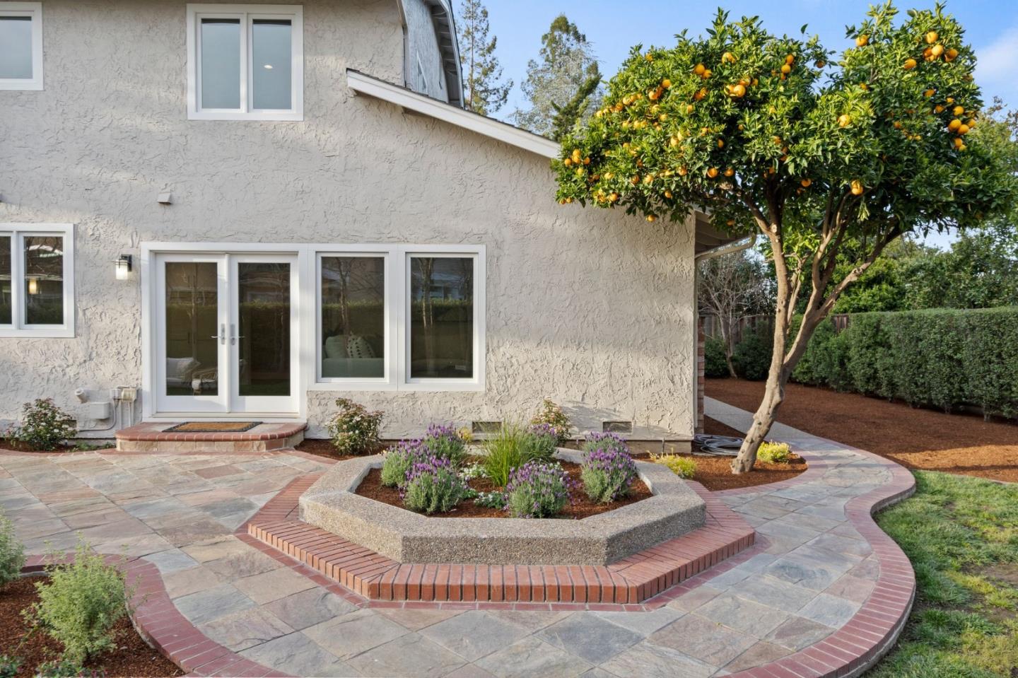 389 Bryant Avenue Mountain View, CA 94040 - Photo 57 of 61 a house view with a garden space