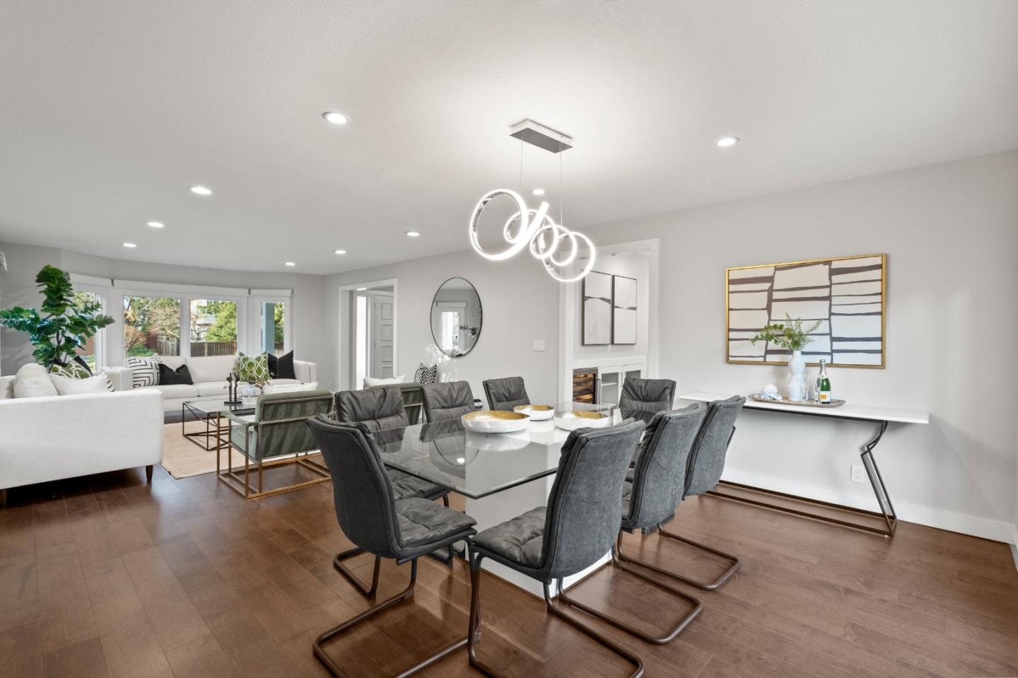 389 Bryant Avenue Mountain View, CA 94040 - Photo 6 of 61 a view of a dining room with furniture window and wooden floor