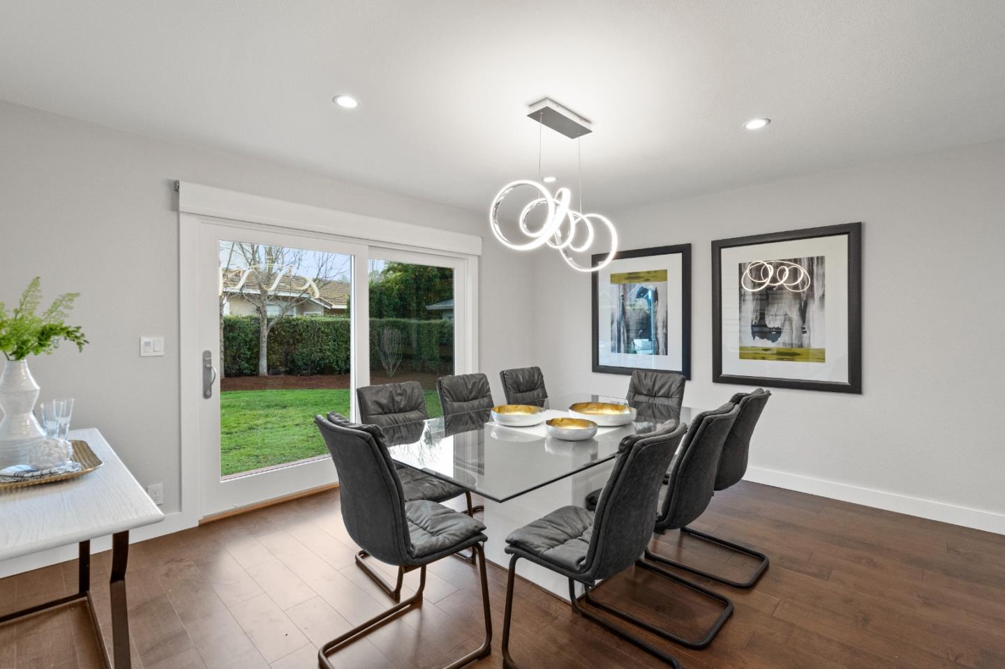 389 Bryant Avenue Mountain View, CA 94040 - Photo 8 of 61 a view of a dining room with furniture window and wooden floor